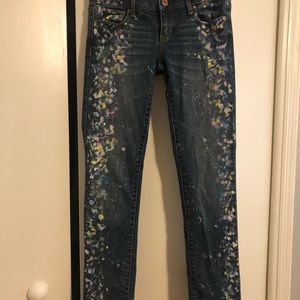 One of a Kind paint splattered jeans